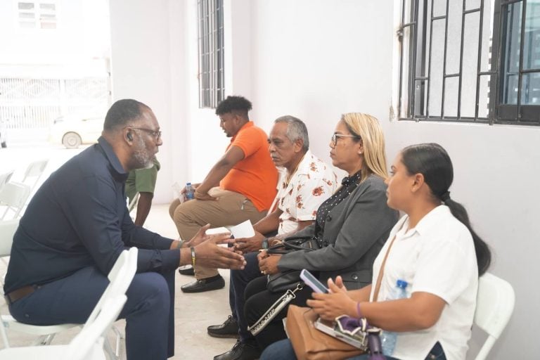 G Mining Ventures representative engaging in a community meeting with local stakeholders for the Oko West project.