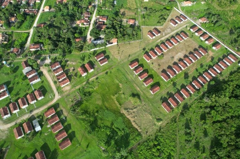 Aerial view of a newly developed residential housing project built by Endeavour Mining for local West African community resettlement near a gold mining site.