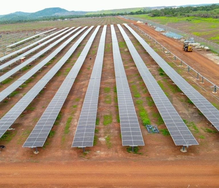 Aerial view of solar panel rows at the Sabodala-Massawa solar farm providing renewable energy to an Endeavour Mining gold operation site in Senegal.